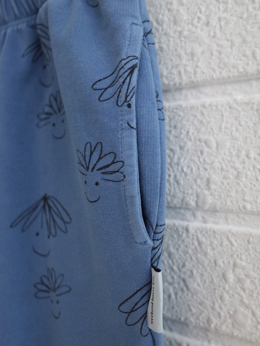 weekend house kids.　ウイークエンドハウスキッズ　happy faces all over sweatpants　キッズスウェットパンツ